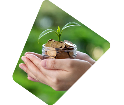 Hands cupping a jar of coins with a small plant emerging.